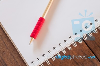 Work Station With Notebook And Pencil Stock Photo