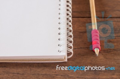 Work Station With Notebook And Pencil Stock Photo