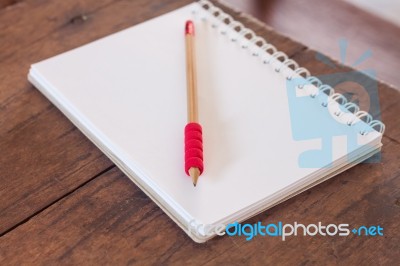 Work Station With Notebook And Pencil Stock Photo