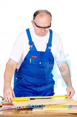 Worker Measuring The Panel, Boards Stock Photo