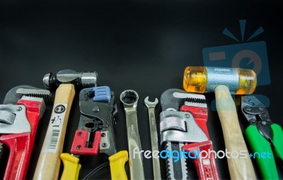 Working Tools On Black Background Stock Photo