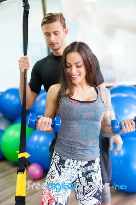 Workout With Couch At Fitness Club Stock Photo