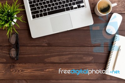 Workspace Wood Table On Top View Stock Photo