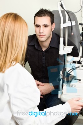 Worried Male Patient Listening Diagnose Stock Photo