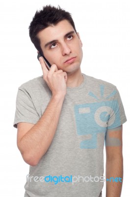 Worried Man On The Phone Stock Photo