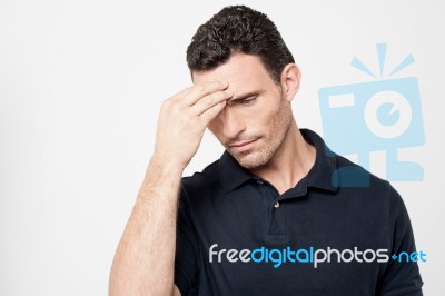 Worried Man Trying To Remember Something Stock Photo