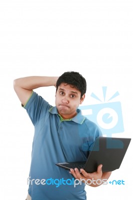 Worried Man Working On Laptop  Stock Photo