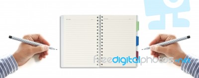 Writing On Note Pad Stock Photo