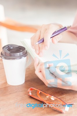 Writing Time In Coffee Shop Stock Photo