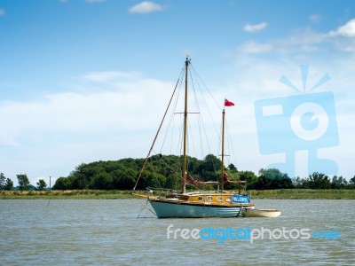 Yacht Moored On The River Alde Stock Photo