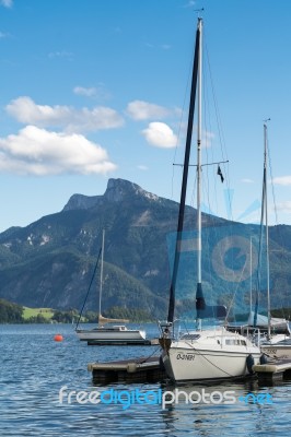 Yachts Moored At Lake Mondsee In Austria Stock Photo