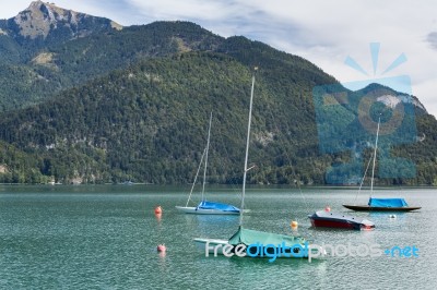 Yachts Moored In Lake Wolfgang At St. Gilgen Stock Photo