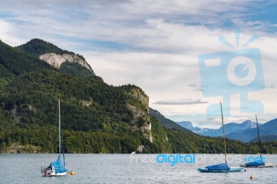 Yachts Moored In Lake Wolfgang At St. Gilgen Stock Photo