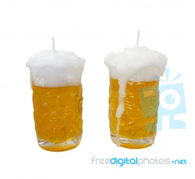 Yellow Beer Glass Candle Stock Photo