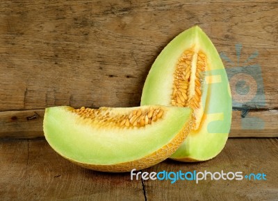 Yellow Cantaloupe Melon On The Wooden Background Stock Photo