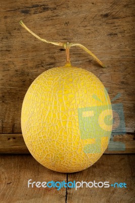 Yellow Cantaloupe Melon On The Wooden Background Stock Photo