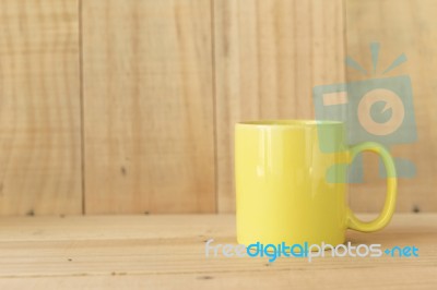 Yellow Ceramic Coffee Mug Stock Photo