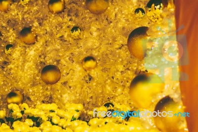 Yellow Christmas Ornaments On Tree Stock Photo