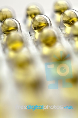 Yellow Fish Oil Pills Stock Photo