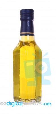 Yellow Glass Liquor Bottle On White Background Stock Photo