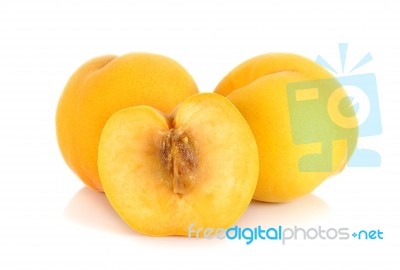 Yellow Peach Isolated On The White Background Stock Photo