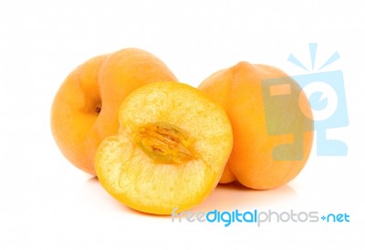 Yellow Peach Isolated On The White Background Stock Photo