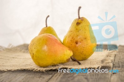 Yellow Pear On A Table Stock Photo