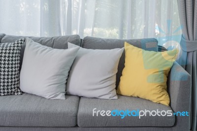 Yellow Pillow On Grey Sofa In Modern Living Room Stock Photo