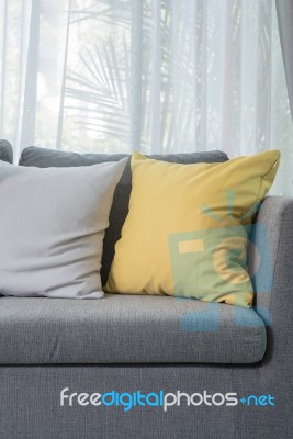 Yellow Pillow On Grey Sofa In Modern Living Room Stock Photo