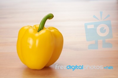 Yellow Sweet Pepper On The Table Stock Photo