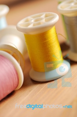 Yellow Thread On Wood Table Shallow Depth Of Field (soft Focus) Stock Photo