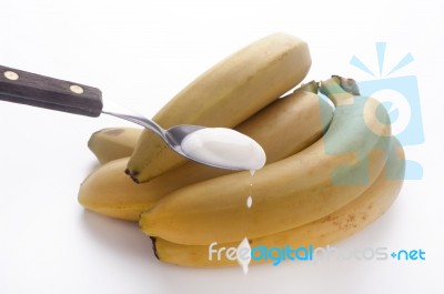 Yogurt To The Banana Stock Photo