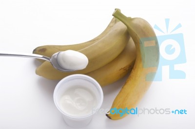 Yogurt To The Banana Stock Photo