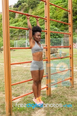 Young African Woman Doing Stretching Stock Photo