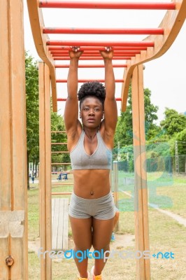 Young African Woman Doing Stretching Stock Photo