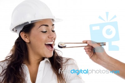 Young Architect Eating Sushi Food Stock Photo