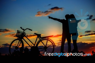 Young Are Happy At Sunset Stock Photo