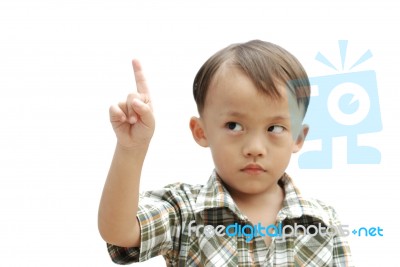 Young Asian Boy With Hand Sign Stock Photo