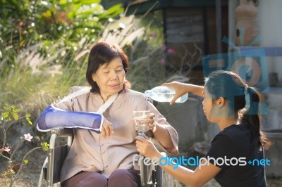 Young Asian Is Take Care The Senior Woman Stock Photo