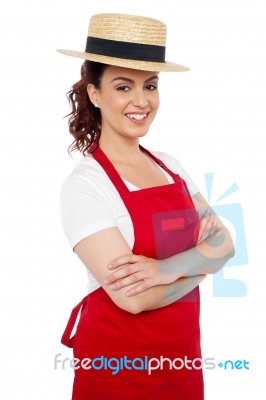 Young Baker Lady Wearing Straw Hat Stock Photo