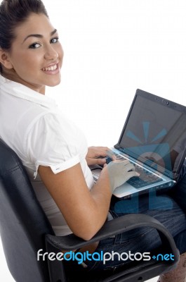 Young Beautiful Female Working On Laptop Stock Photo