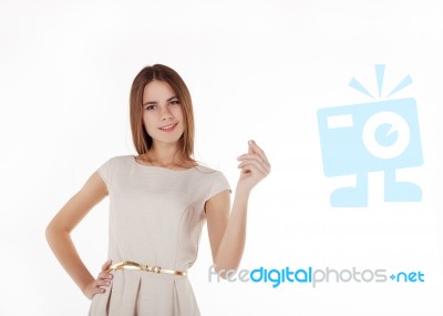 Young Beautiful Girl Holding An Imaginary Credit Card Stock Photo