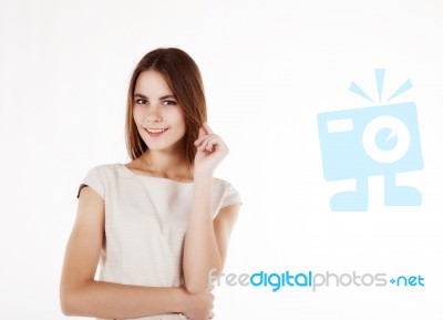 Young Beautiful Girl In A Bright Dress Stock Photo