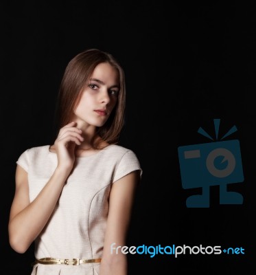 Young Beautiful Girl In A Bright Dress Stock Photo