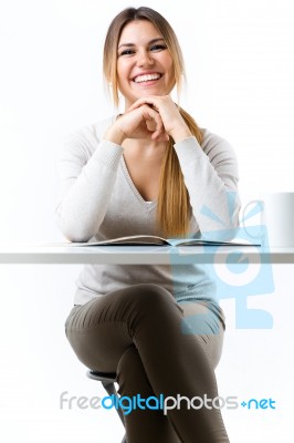 Young Beautiful Girl Reading News And Drinking Coffee. Isolated Stock Photo