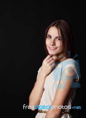 Young Beautiful Smiling Girl In A Bright Dress Stock Photo