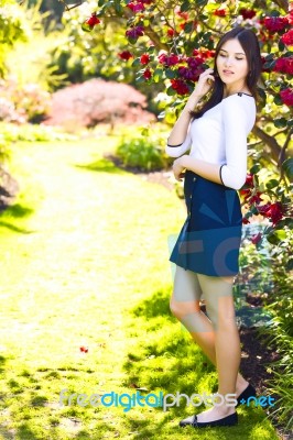 Young Beautiful Tall Woman With Long Straight Dark Hair Posing A… Stock Photo