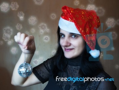 Young Beautiful Woman Holding A Mirror Ball Stock Photo