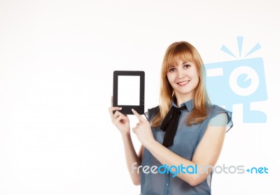 Young Beautiful Woman Holding A Tablet Stock Photo