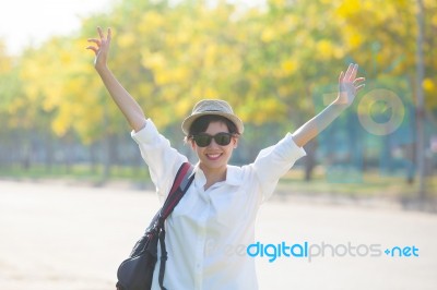 Young Beautiful Woman Wearing White Shirts ,straw Hat And Sun Gl… Stock Photo